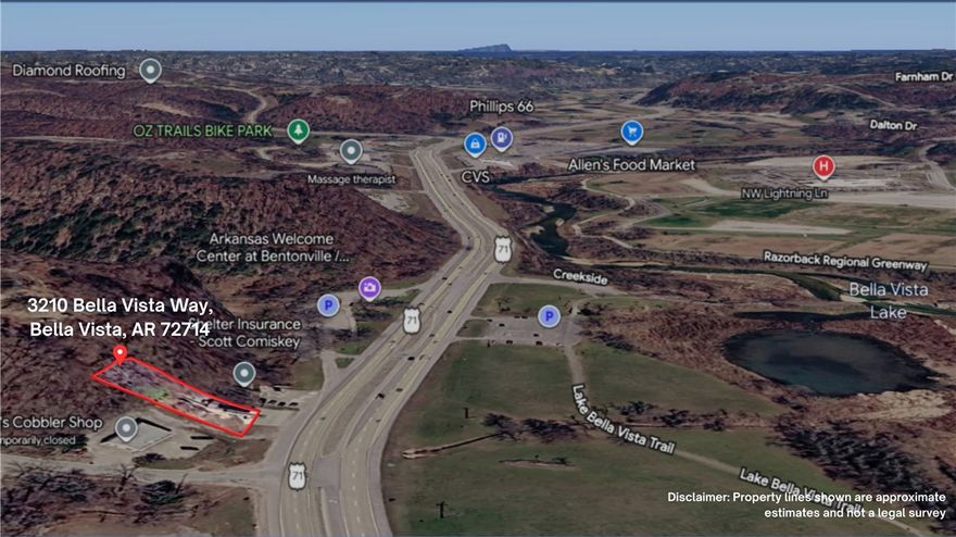 Here it is, possibly the nicest office in NWA. You can see the heart and soul that was poured into this project with the details and character everywhere you look. From the Flagstone tile in the foyer and bathroom to the wood beams, and tongue & groove ceiling, and custom cabinetry throughout. Being constructed into the natural cliff, allows for a unique private patio/outdoor space. Although located on HWY 71, it is a very peaceful setting, overlooking the Bella Vista Lake and Little Sugar Creek. The Bella Vista Park area (Just across the HWY) connects to the Greenway, and the Back Forty Trails. The Tunnel Vision Trail heads just up the hill to the west close to where the bike lift will be constructed. If all of this wasn’t enough, there are 2 other income producing opportunities, a separate office space downstairs, that could be rented and the billboard on the property does Generate an income.