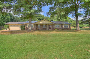 Have you been looking for a nice home with a little land close to town? Look no more this is it. Totally remodeled kitchen with granite counter tops, flooring and more. The floor plan is open and great for entertaining family or friends. Relaxing is no big trick either on the covered porch or sun room. Outside 3.75 acres with a barn offers room to run. All this four miles from Wal Mart!!