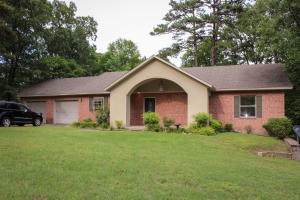 Lovely home on a large lot in Skyline Manor. This house features an open floor plan and an oversized garage. From the master bedroom, enjoy walking out to your private patio that overlooks its large, open backyard.