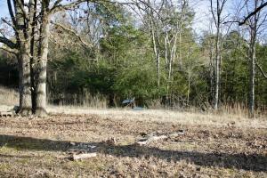 As is where is sale of over 5 acres and home. Great location close to the interstate for easy transit. Property also includes like new storage building and storm shelter. Call for your showing today.