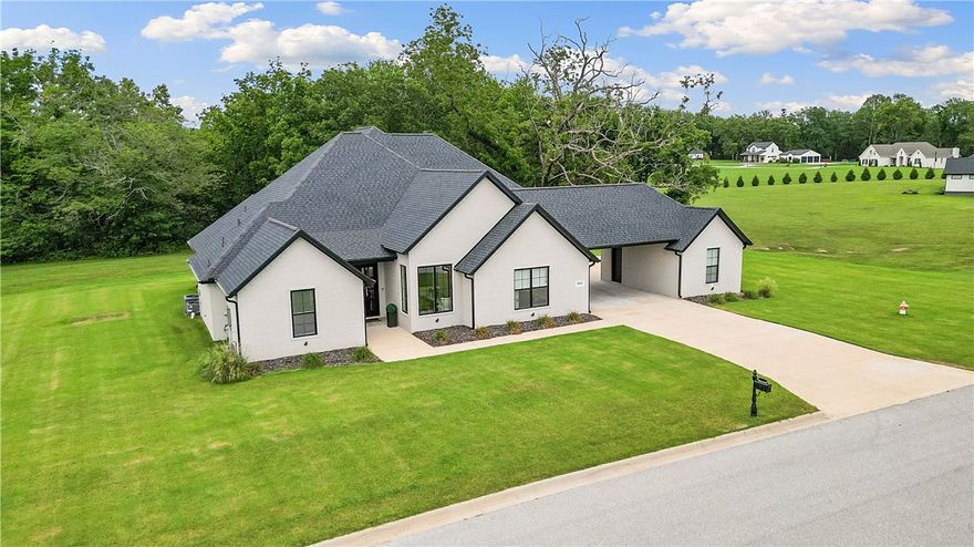 Check out this 4 bedroom/4 bath home in the beautiful Riverside Estates, sitting on just under 2 acres. If you are looking for a like New construction home, large and peaceful estate sized lot, plenty of room to entertain, and modern quality-style touches, this may be the home for you! Three bedrooms are on the main floor, a formal dining and eat in kitchen, large open living and kitchen island, and plenty of pantry and under stair storage! Upstairs you will find a large open second living room/bonus space, an additional full bathroom, and another bedroom with large closets. This home has plenty of garage spaces, outdoor entertainment patio to watch the deer in the woods, entertainment potential, and has a TON of upgrades! Don’t miss this rare listing in the growing Fayetteville/Goshen area!