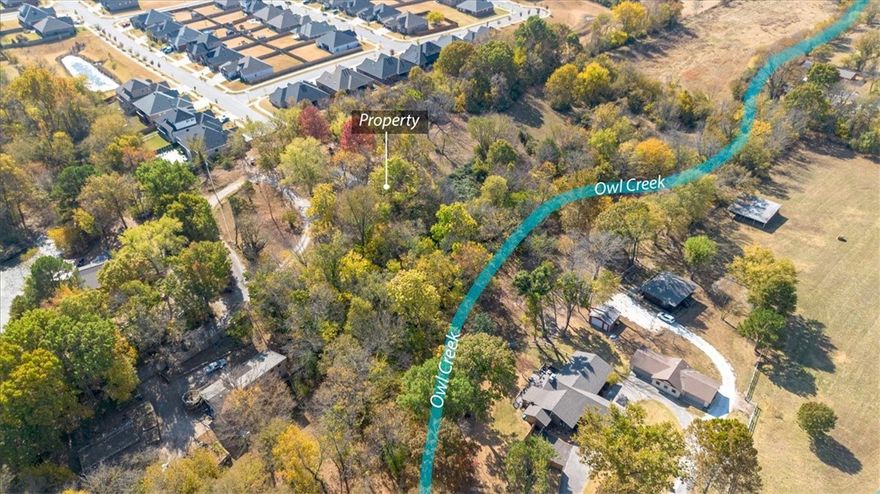 All VALUE is in the land! Welcome to this Fayetteville gem in a prime location! Want to build your dream home or even build a SD!?  Set on a spacious 5.33 acres, this 1,638 sq ft home offers classic charm and plenty of potential, selling as-is. Built in 1956, the property includes 4 bedrooms, 2 full baths, central heating and cooling, and two cozy fireplaces. The large carport and multiple outbuildings add convenience and storage, perfect for hobbies or extra space. With close proximity to Farmington School District and easy access to Fayetteville’s amenities, this property provides a unique opportunity for those looking to renovate, expand, or enjoy rural living near town. Don’t miss the chance to make it yours! As-Is-where is.