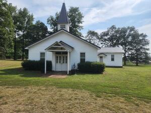 Own a piece of Arkansas Ozark Mountain history! Known as the Batson Baptist Church, structure is in good shape just minutes from Mulberry River, Ozark National Forest, and dining at the Oark General Store! Lots of potential in the 1937 sq ft church building. Plumbing updated 7 years ago, rewired 5 years ago, new propane line 1 year ago. Call Today!