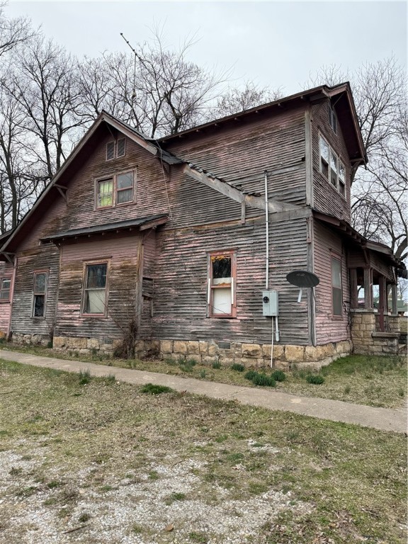 This home needs a total remodel or torn down but located on busy highway
