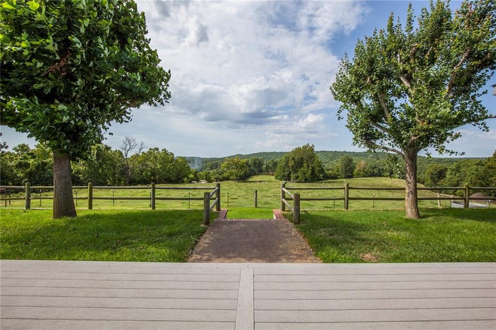 ESCAPE TO YOUR OWN PRIVATE 50 ACRE GETAWAY COMPLETE WITH A 4,000 SQ FT UPDATED HOME, A 40 X 60 BARN W/ 12’ OVERHANGS ON EACH SIDE, TONS OF AMAZING WILDLIFE INCLUDING DEER AND TURKEY, AND A PEACEFUL AND TRANQUIL SETTING PERFECT FOR RAISING CATTLE OR CREATING YOUR OWN HUNTING PRESERVE! The property is equine ready and set up for cattle with Bermuda pastures, corals, a pond and good fencing. The one level home features 2 living areas, large sunroom, formal dining room, study/office with built-ins and an updated kitchen, master bath and guest bath! New roof, 2 new HVAC systems installed in 2018, new composite deck overlooking the breathtaking setting, quartz countertops, new appliances, Pella windows, solid oak cabinets, 2 x 6 walls, 3 wood burning stoves.