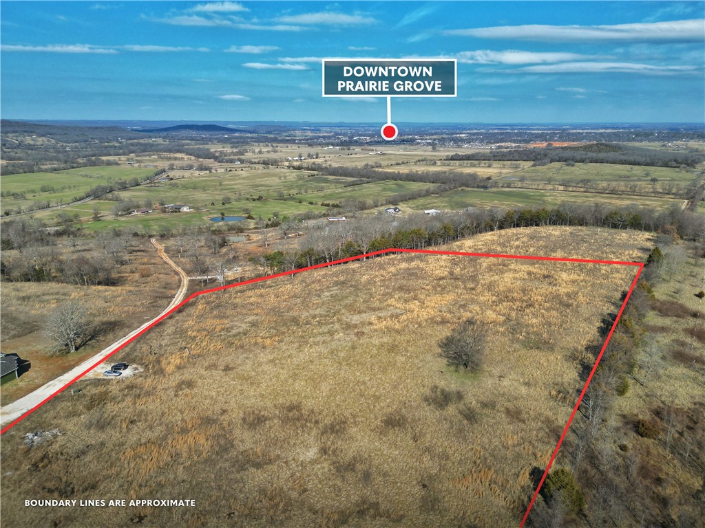 8.05 acres M/L of cleared pasture land at the top of the hill! Beautiful sunset views and quick access to Prairie Grove. Electricity and Fiber are at the road. Seller to share costs of road improvements after sale. Beautiful views perfect for your future homestead.
