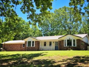 Check Out this Price! Country Living!!! Newly updated house throughout including a breathtaking kitchen with Granite countertops. New Windows, New Flooring, New paint, New, New New......Next step into your over-sized Master Bedroom and feel instant relaxation. With Tub and shower combo, you can either take a nice bubble bath or a quick shower. Walk in closets, nice extended covered back porch, and lets not forget the many outbuildings you can put all those Christmas Decorations or your yard tools. Let your kids be kids on the 9+/- acres including a pond!!! Don't miss out on this one of kind home, book your showing today!!!