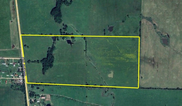 Discover 91 beautiful acres located just outside Gravette with excellent road frontage on Highway 43. This versatile property offers a prime opportunity for farming, or building your own private estate. Featuring two scenic ponds and a mix of open grazing hay land and wooded areas, the land provides a serene and functional landscape. Utilities such as a well and septic will be needed, giving you the freedom to design infrastructure to suit your needs. With its convenient access and abundant natural features, this property is a rare find!