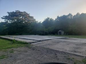 House burnt that was on property. 2.84 acres with utilities and outbuildings. Sold prior to listing.