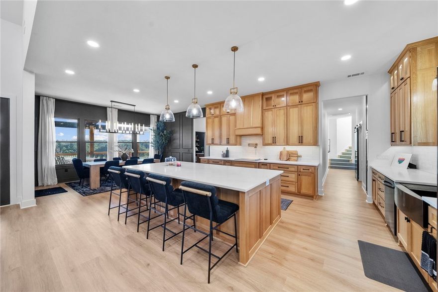 Modern Custom Built home on 30 plus Acres! Nestled on over 30 acres, partially fenced with a gated entrance, this brand-new custom-built home offers both sophistication and functionality. Inside, you’ll find 3 spacious bedrooms, each with its own en-suite bathroom, plus a guest half bath on the main level. A private office off the living area showcases stunning views of the acreage, while upstairs features an oversized bonus/media room perfect for football games and movie watching nights. The impressive 1,200 sq. ft. garage boasts insulated doors, 9-foot clearance, and a built-in dog wash station. Not only do you have a separate screened in patio, you have a gorgeous outdoor covered patio for entertaining. For peace of mind, the home includes a safe room/tornado shelter and a whole-home Generac system. Don’t miss your chance to own this one-of-a-kind retreat. Schedule your private showing today!