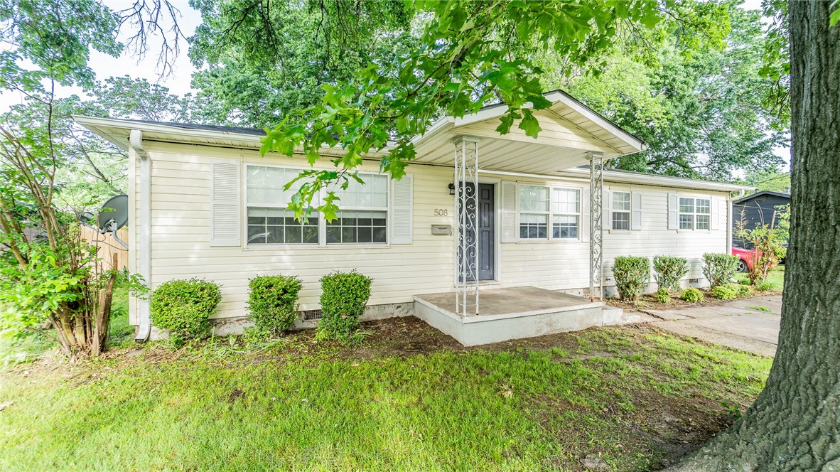This charming 3-bedroom, 1-bath home is in the heart of Springdale! This home has an oversized laundry room with floor to ceiling built-ins and a bright, airy sunroom off the primary room that could be used as an office or flex space. The large backyard offers mature trees and room to play or garden. Conveniently located near schools, parks, shopping, and dining, this home provides easy access to everything you need. Whether you're a first-time buyer, looking to downsize, or seeking an investment property, this home is full of opportunity. Home is to be sold AS-IS. Washer, dryer and refrigerator convey!