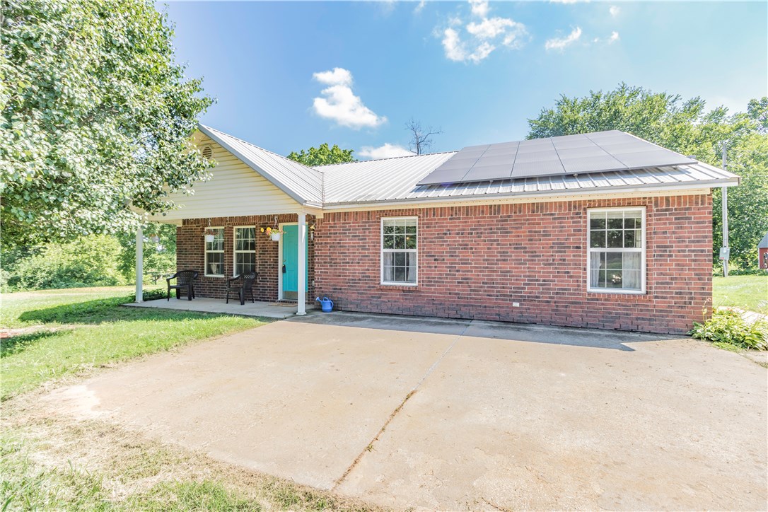 Enjoy country living near the city! Beautifully remodeled 3 bedroom home on 1 acre! Home has been updated with new HVAC, new water heater, new flooring and all new screws in metal roof. Solar panels installed late 2017 and septic pumped about 1 year ago. Cozy living room offers vaulted ceilings and corner fireplace. Lovely eat-in kitchen provides informal dining and cabinets galore. Large bonus room is great for the kids or extra living space. Relax outside while taking in the splendid views of the countryside. Do not waste your time on this one and make it yours today!