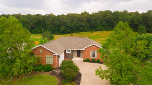 Wellington's best! Lovely custom built 4BR/3BA home with over 3000 square feet and an open floor plan. 10' ceiling in the LR and tray ceiling in the master bath. 2 fireplaces, built-in surround sound speakers, custom built-in closets, finished basement with dens, 4th BR bonus area or 5th BR. Workshop and lots of storage. You will totally enjoy the back deck, professional landscaping w/sprinkler system, privacy fenced backyard, 3 car garage, built in swing set and the list goes on!! Nice and ready to be called home.