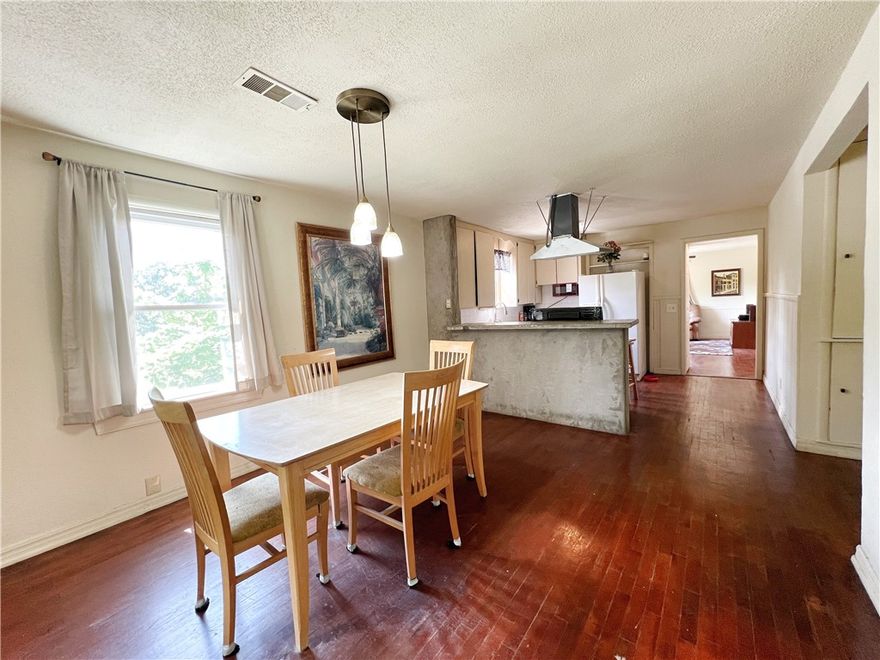 This duplex is currently zoned RMF-12 and sits on .37 acres. This property is only a 6 minute drive to the University, 4 minutes to I49, and 10 minutes to Dickson St. The upper level unit offering a split floor plan with 3 bedrooms, 2 bath and original hard wood flooring throughout the open dinning and kitchen to the large living room. Downstairs includes 2 bedrooms, 1 1/2 baths, office space. The lot includes off street parking.