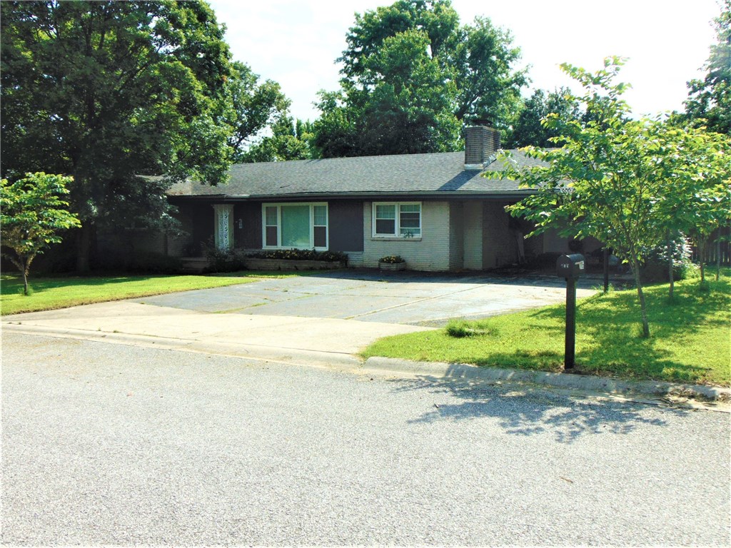 Here is a 3 Bedroom, 1 1/2 Bath home with a fairly open floor plan. It has central heat and air, an attic fan, wood burning fire place, Remodeled kitchen about 3 years ago, Stainless Appliances, new dishwasher and disposal about a month ago, Jacuzzi tub, Linen closet in bathroom. Large living room, Ceiling fans, dedicated laundry room, 2 car carport with a 3 car concrete driveway, Privacy fenced backyard with 4 cherry trees, 4 apple trees, a 12x12 Shed with a concrete floor with electric and Ac unit.