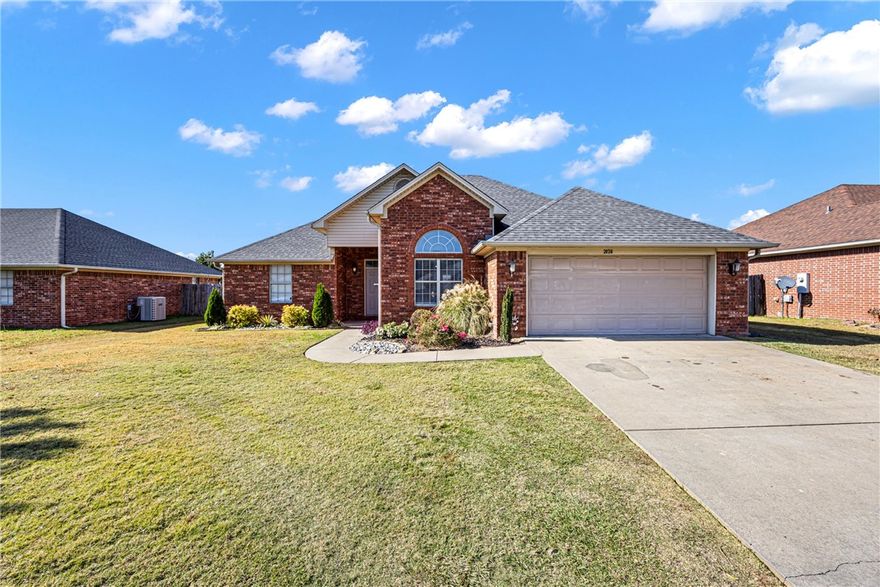 This well-kept 3-bedroom, 2-bath home features 1,602 sq. ft.of comfortable living in a convenient location close to Russellville High School. The property offers beautiful landscaping, a functional layout, and a bright living area that flows into the kitchen and dining space.

The primary suite includes a remodeled bathroom with a tiled walk-in shower, giving it a clean and updated feel. The additional bedrooms work well for family, guests, or a home office. Outside, the yard is nicely maintained and easy to enjoy.

A move-in-ready home in a great location—simple, clean, and easy to make your own!