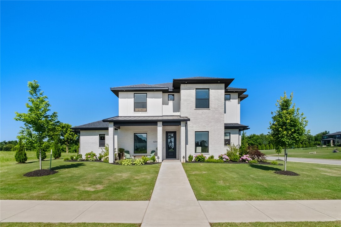 Elegant luxury meets thoughtful design in this executive home. The corner lot home in gated SV backs up to the 14th green & lake & is caddy corner to the 15th tee for views all around. The home is bright & airy with 43 windows & tall ceilings. The gourmet kitchen boasts Cafe appliances, quartz counters & display cabinets. Adjacent find a dry bar & butler pantry. Enjoy the primary suite with his & her designer closets, walk in shower & soaking tub. Rounding out the downstairs is a dining room with accent walls, custom office with privacy doors & open family room with a wall of glass windows/doors to enjoy the view. Upstairs find a bonus room with wet bar, 3 spacious bedrooms with Jack&Jill & ensuite designs. Enjoy the expanded patio with gas FP overlooking park like landscaping and golf course views. 3-car garage with epoxy floors, security system, B'ville schools, & thoughtful storage are a few additional highlights. This home offers the best of luxury, function & location. Reach out for full features sheet.