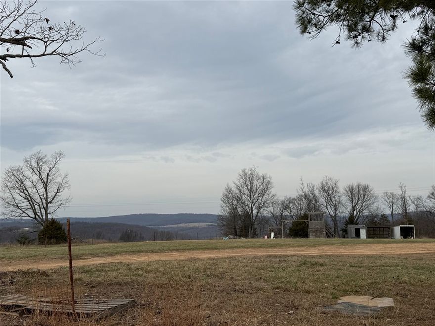 Discover 37 scenic acres near Wharton Creek in Arkansas with a desirable blend of open pasture and  woods. This rural property includes two mobile homes, rural water, and stunning views, offering endless possibilities for a homestead, or wonderful investment opportunity. Property is being sold as-is.
