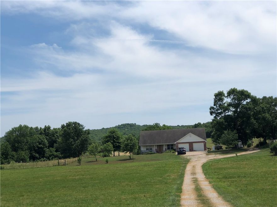 Beautiful farm 2000+ sq ft home with lots of farm land, several ponds and wet weather creek. cleared pasture ;and to raise cattle and lots of wildlife.