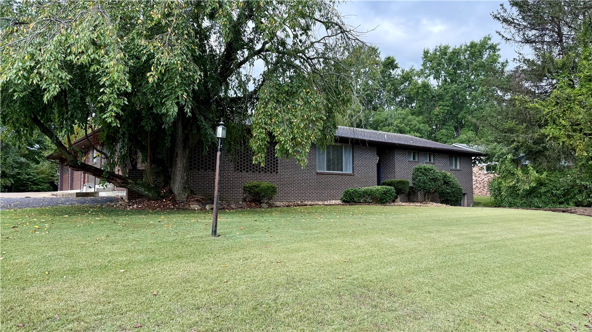 You couldn't ask for a better location, quiet neighborhood, close to everything. This well maintained home was one of the finer homes in Harrison when it was built and it is still in great condition today! 3 bedrooms, 2 full baths and 2 half baths with an extra large 2-car garage. The open floor plan is perfect for entertaining. The basement area is heated and cooled and can be used as additional living space or as an additional bedroom.