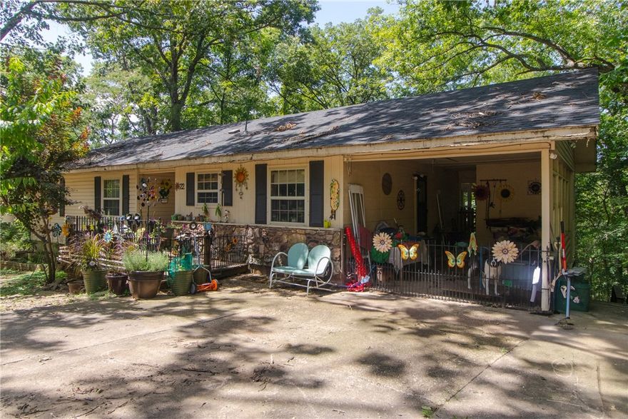 If you love nature and wildlife, you would love to see this home. It is conveniently located very close to the Back 40 Trail Head, and is near the splendid amenities that Bella Vista has to offer. This home has 3 beds and 3 full baths. It has a spacious bonus room with heating/AC. Includes a pool table! Another amazing feature about the basement is it has a full bath and the availability to put in a washer and dryer (besides the one from the main floor). It includes a porch with a nature view (with removable screens), and a lower patio. Great opportunity for investors; possible Airbnb because of the exterior entrance/walkway for the basement. New roof in 2023, new dishwasher 2025. Many recent updates have been made. It has custom built wooden cabinets in the kitchen, island, and living room. Move in ready, or update to your desires. Don't miss out on this peaceful home!