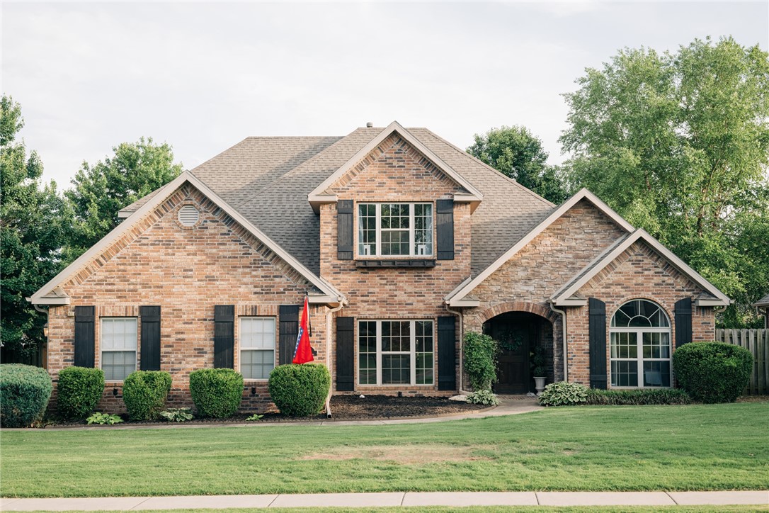 A truly unique and well-maintained home in a highly sought after, established neighborhood. Great location, only 10 minutes to downtown Bentonville and 15 minutes to XNA airport. The features are endless: large corner lot, oversized master bedroom with his and her closet, three car garage (with storm shelter), crown molding throughout, as well as custom pantry and lockers. Downstairs you’ll find the large living room with many windows and beautiful gas fireplace, an updated kitchen with built-in bench and induction stove, and a versatile office with a murphy bed for additional guest space. Upstairs are two large bedrooms with Jack & Jill bath, a large bonus room (4th Bedroom), and a large attic for extra storage. Neighborhood amenities include two parks, a clubhouse, and a pool. Roof is only four years old and water heater is new.