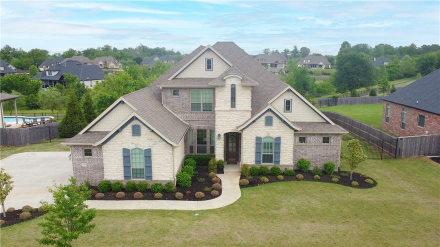 Beautifully cared for one-owner home in desirable Otter Creek subdivision, this home is on an estate sized lot and an entertainer’s DREAM! Step inside to find a large dining room that leads to open-concept living area with gas fireplace and beautiful kitchen with double ovens and high-end appliances. The spacious living area and kitchen flow out onto the covered patio and pool making this home perfect for entertaining. Outside, there is a fire pit that will have you warm all winter long and a gate that leads directly to the walking trail. The generous primary room as well as two bedrooms are located on the first floor. Upstairs, there is a large bonus room with endless possibilities and one additional bedroom that gives privacy and would be perfect for guests. This home is a must-see! It really does HAVE IT ALL!!