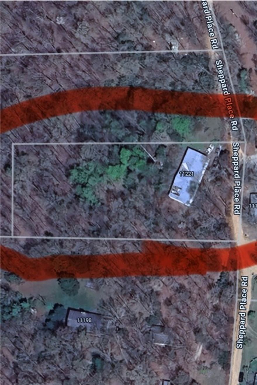 Welcome to the country live. Build your own home or bring out your own mobile home.  
The mobile home on the property will need to be moved, it is not livable. 
It is sitting on a permit foundation that could possibly be reused Value is only in the land.