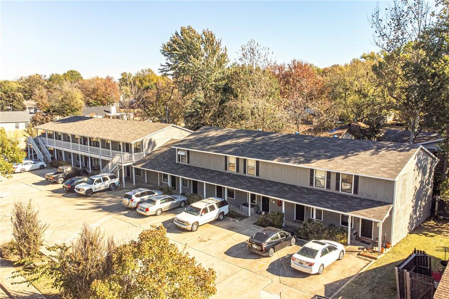 BARCELONA: MULTI FAMILY COMPLEX: This 13 Unit property located in the heart of Fayetteville is located minutes away from Washington Regional Hospital, Shopping, eateries, I-49, and more! All units leased!! Currnet Annual Gross Inc: $114,420 Potential Gross Inc: $133,500! Property Features 8 Apartments 5 Townhomes, on-site laundry unit, and storage/office unit! 1 One bedroom apartment, seven 2 bedroom units and share use of on-site laundry. Townhomes feature main floor living/kitchen, main floor half bathroom, private laundry space, private patios, and 2 bedrooms & 1 full bath upstairs. 2016 & 2032 N GREGG Avenue: 8 Unit property located in the heart of Fayetteville is located minutes away from Washington Regional Hospital, Shopping, eateries, I-49, and more! All units leased!! Current Annual Gross Inc: $73,920 Potential Gross Inc: $76,800! Property Features two 4-plex buildings containing a total of 8 units combined! All units feature 2 bedrooms, 1 bathroom, living, kitchen, and washer/dryer hookups!