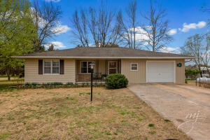 Nestled on 5 beautiful lots near the blue waters of Bull Shoals lake this 2bed 1.5 bath home is an absolute gem! the interior boasts nice open floorplan, propane fireplace, updated kitchen, updated full and half bath, new floor coverings in bedrooms, new pex plumbing under the home and more! The exterior is the perfect place for entertaining with features such as relaxing back deck, 15X22 shop for your toys, 10X22 lean to for your boat or golf cart and a large lawn for your summer BBQ's. All of this located near Sugarloaf Harbor Marina and an 18 hole championship golf course!