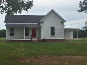 Great renovated Farmhouse. All new paint, carpet, and kitchen appliances. 3 bedroom, 2 bath. Large living and formal dining. Nice front porch. Large storage room off of carport.