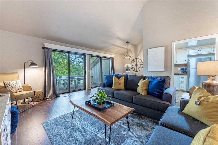 Welcome To Your Next Investment! This Fabulous, Updated Townhome Delivers The Full Package. Spread Over 2 Levels, Each Of The 2 Bedrooms Comes With Its Own Attached Full Bath—One On The Ground Level And One Upstairs. The Upper Level Also Features A Dedicated Office Nook. Soaring Ceilings In The Living Area Create An Open, Airy Feel, While The Kitchen And Dining Space Offer Both Style And Practicality With Great Storage Throughout. Step Outside To A Fantastic Back Deck Overlooking The Golf Course, With Storage For Bikes And Gear Right Off The Deck. Metfield Golf Complex/Clubhouse Just Across The Street, Blowing Springs Greenway Right Out Your Back Door, And The Metfield Skills Bike Park, Swimming Pool, And Activity Courts All Within Walking Distance. Dedicated Covered Parking Adds To The Package. Offered Fully Furnished And Fully Stocked, This Active Short-Term Rental Is Truly Turnkey—Perfect For A First-Time Investor Or A Seasoned Pro Looking To Add To Their Portfolio. This One Checks Every Box, For Real.
