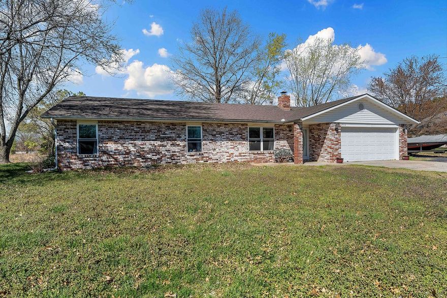 Ranch Style 3-bedroom, 2-bath home sits on 1.40 acres allowing for added space for your enjoyment. Covered back patio provides a relaxing atmosphere looking out on the huge backyard that is partially fenced. This house provides an excellent potential for someone who wants to have a home-based business with extra parking already in place along with RV 50amp service. This property is conveniently located off of Hwy 112 and close to I49 and next door to a new landscaping business. Whether you are looking for a great residential home on land or a potential business opportunity, this might be it. All buyers need to do their due diligence to verify zoning needed and businesses allowed with the City of Springdale.