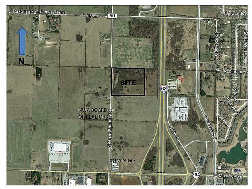 Ready for commercial development. In the City of Lowell commercial overlay district with all city utilities. 660 feet of frontage. Easy access to I-49. The Razorback Greenway runs along the front of the property. Seller has demolished and removed house and done clean up of underbrush.