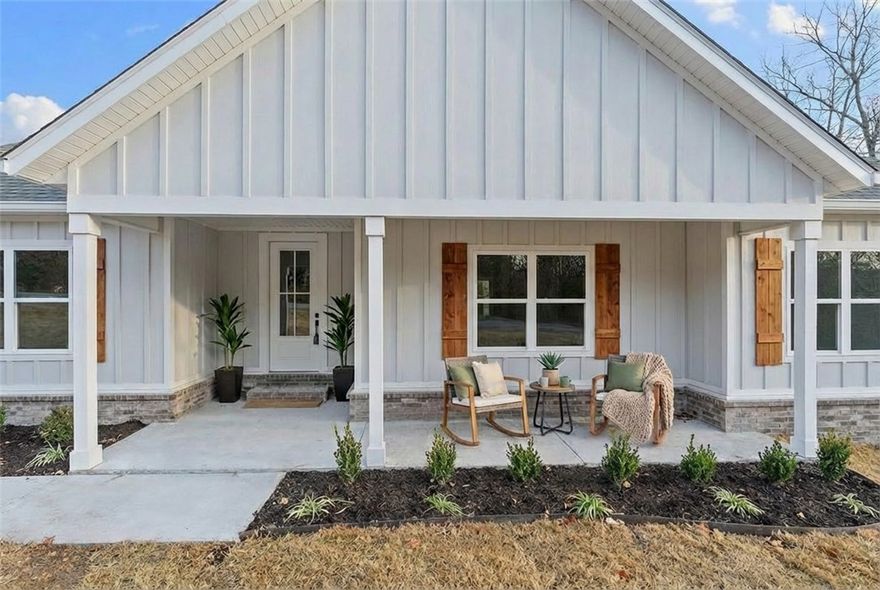 This gorgeous new construction is the perfect canvas to create your cozy retreat. From the moment you step inside, you’ll be drawn to the stunning 7” hand-scraped engineered white oak floors that flow seamlessly through an open, light-filled floor plan designed for both everyday living and effortless entertaining. Step outside to your oversized back deck—an ideal spot for morning coffee, evening gatherings, or simply soaking in the quiet beauty and privacy of your wooded surroundings. Enjoy neighborhood walks offering peaceful lake views. Beyond your doorstep, enjoy access to Bella Vista’s premier amenities, including world-class mountain biking and hiking trails, multiple lakes, golf courses, pools, fitness centers, tennis and pickleball courts, archery ranges, and even relaxing saunas. You’re not just buying a home—you’re stepping into a lifestyle of comfort and outdoor adventure, all wrapped in a peaceful retreat you’ll love coming home to.