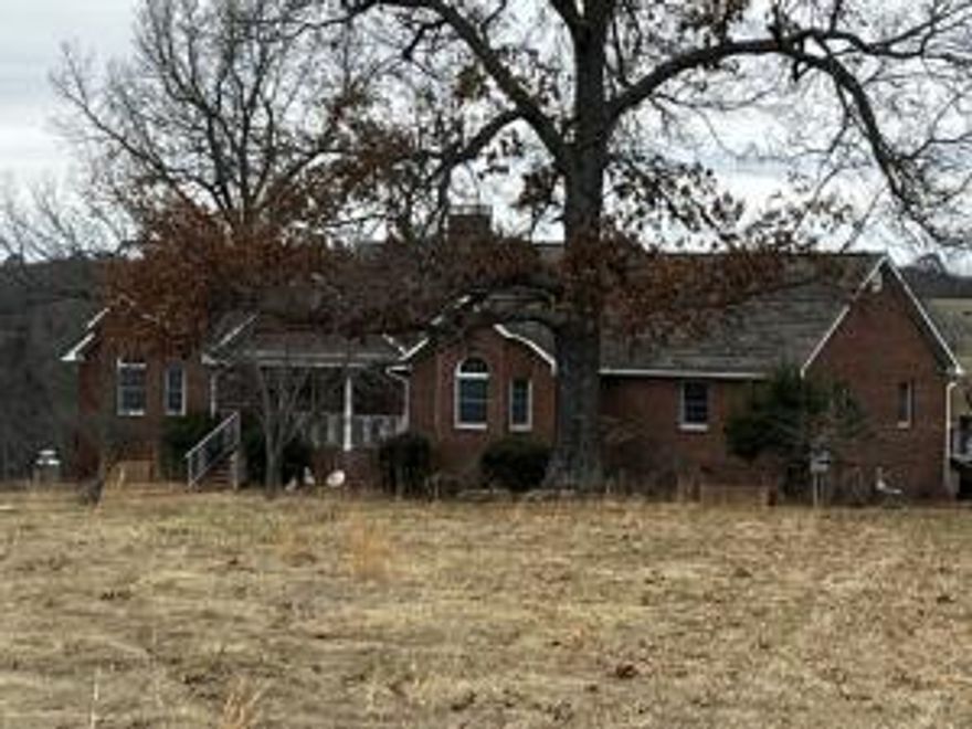All Brick 3 Bedroom with finished basement for potential additional bedrooms.  Cathedral Ceilings with propane fireplace. On appx 18 AC private Acres with Metal shop.