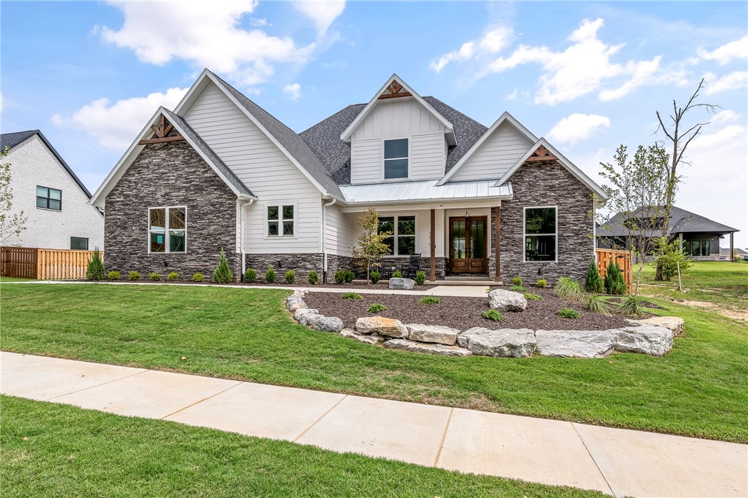 Stunning New Construction with a Best-Selling Floorplan in the sought after Big Sky Subdivision! All the quality and extras you expect throughout from one of the top builders in NW Arkansas. Large light-filled open living space featuring a gourmet kitchen with huge island, tons of cabinets, double ovens, gas cook-top and butlerās pantry. Downstairs also features the Master suite, formal dining, office or optional 5th bedroom. Upstairs features 3BRS, 2BA and large media/game room with built-in wet bar. Covered back patio fenced yard, complete home security system and smart home wired. Professionally landscaped, sodded yard and sprinkler system. Home is complete and move in ready! No time to wait!