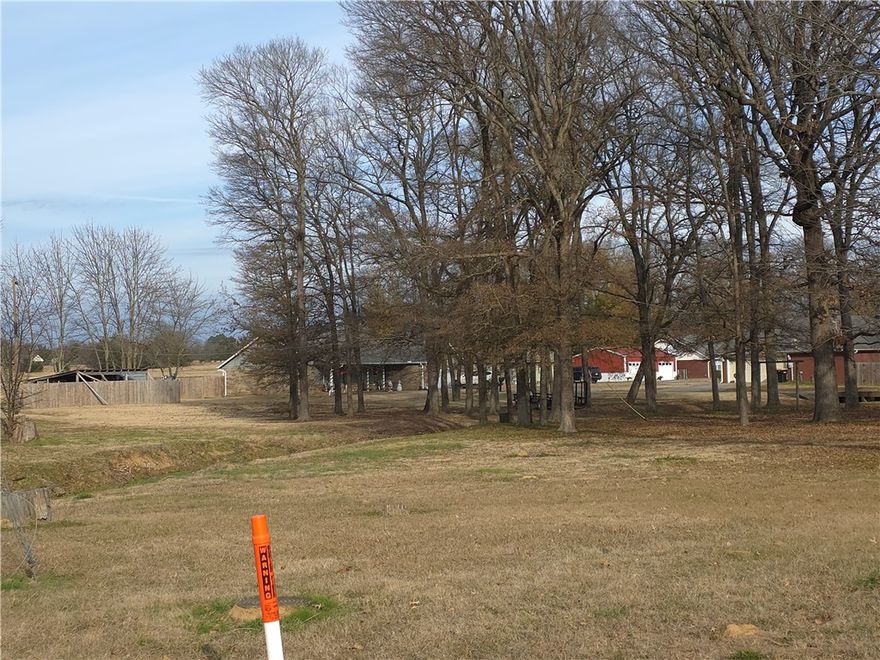 Excellent opportunity to acquire an undeveloped commercial lot located at Hwy 22 & Lincoln Dr in Charleston, Arkansas. This high-visibility site is diagonally positioned across from the local school, is conveniently located near other businesses, offering excellent exposure in a growing market. This commercial lot has access from Lincoln Dr. Two additional commercial lots are creating opportunities for expanded development. The property has a wet-weather branch along the back, documented by FEMA as (SFHA). The owner has never seen the property flood though the rear portion has wet conditions during periods of heavy rainfall. Buyers to conduct all due diligence regarding floodplain considerations. Lot dimensions & acreage are approximate;Buyer to verify all measurments. Buyer to verify availability, capacity, & securing utility services. Mineral rights do not convey. With anticipated growth in the Charleston area this is a prime opportunity to invest in a strategic Main Street location. Don’t miss this opportunity!
