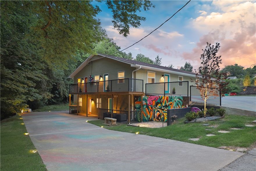 Turnkey invest property currently yielding a 5.3% Cap with the potential of 6.9% Cap Rate due to increased bookings this year. Welcome to LOCAL AT COLER, a successful short-term rental community. This 6 units INTENTIONAL COMMUNITY has amazing outdoor spaces for large gatherings and a private Speakeasy/communal area. Local at Coler is located off NW 3rd Street on the connector street from downtown Bentonville to the Coler Trail head. You are a 6 minute bike ride from the square, 4 minute ride to Coler Mountain Bike Preserve and a 12 minute ride to Slaughter Pen. There are several places to eat with-in walking distance. The building was completely renovated in 2023 with new windows, mechanicals, flooring, appliances and more. Outback you will love the silo bar/grilling area with large firepit nestled in the hillside and trees. There is a wet weather creek and several secluded spots to enjoy mother nature while still being right in the middle of town. Ask for revenue worksheet attached in MLS.