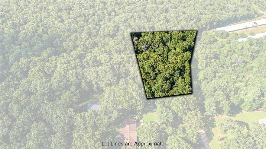 Serene 2.3-Acre Lot in Ozark Estates only 7 miles from Centerton. Private, wooded lot on a quiet cul-de-sac surrounded by spacious homesites with 2+ acre parcels. Enjoy peace, privacy, and the beauty of nature, all while being close to town amenities. Water approx. 800–900 ft from property. Ideal for your custom home! Don’t miss your chance to own a slice of the Ozarks and build the home you've always envisioned!