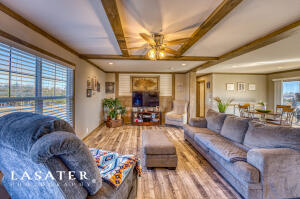 Lake, Lake Lake! Dreaming of living on the lake? This is the home for you!! This 3 BR 2 BA Home boast an open floor plan PLUS a split floor plan as well. 8 acres with plenty of flat space to build a pool, large deck, etc. The skies the limit on this property. Minutes from the Bull Shoals Lake Marina, this property joins the core with a quick walk to the Lake! Take a look at the video.