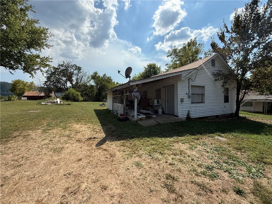 Great investment opportunity! This 2 bedroom, 1 bath home is currently a rental and offers plenty of potential as a fixer upper. Exterior features include vinyl siding, metal roof, and a covered carport for convenient parking. Home does not currently have heat or air installed. With some updates and repairs, this property could make a solid rental or flip. Located just minutes from all the conveniences of downtown Marshall.