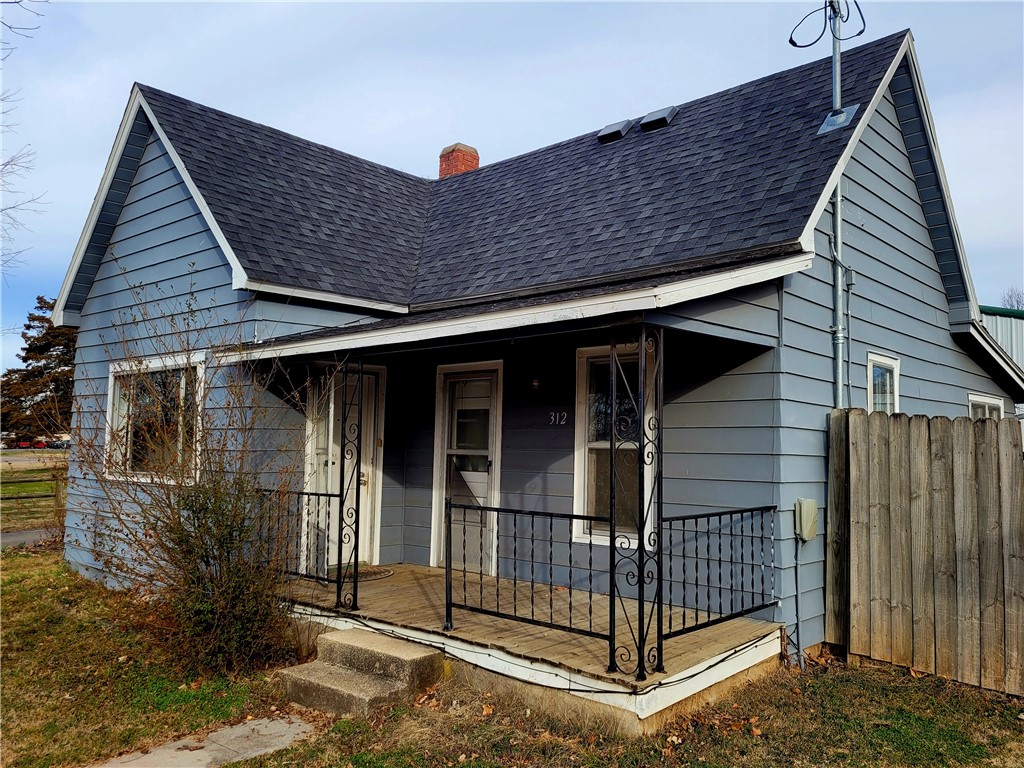 Right in the heart of Prairie Grove! 2 BR, 1 BA home sits on .09 AC +/-. New roof in 2020. SOLD AS-IS. Sellers will make no repairs. Buyer will be responsible for turning on any utilities for inspection. Shop behind carport does not go with property. Property subject to survey. Would make a great office or boutique. House need major renovations. Washer & Dryer do not convey. Agent owned