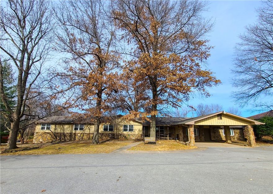 4,206sf 10 bed 8 bath building with 6.11 acres for sale. Six of the bedrooms have en suite bathrooms. Ideal for a small multi-family development, group home, rehabilitation facility, assisted living. All utilities are on site. Close to medical, restaurants, schools, shopping, and downtown Springdale. Building sold As-Is. Also listed as land #1263621