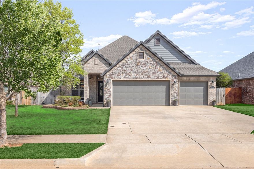 Beautiful 4 Bedroom home in Rolling Acres Subdivision! This home boasts great curb appeal with covered front porch and landscaped yard. Foyer entry welcomes you in. A guest bed with attached full bath located off entry. The spacious living area has a fantastic layout, with large living room, dining area and kitchen with double islands. The living room has a gas fireplace with ship lap detailing. The kitchen has granite counters, abundant workspace, gas range and huge pantry for even more storage. Primary suite has large windows overlooking backyard, and attached bath with large double vanity, soaking tub and shower. The large WIC connects to laundry room. There is a half bath on main level for guests along with mudroom area with access to the 3-car garage. Upstairs are two well-appointed guest rooms along with a guest bath w/double vanity. Outside enjoy a private and fenced backyard with covered patio and fresh landscaping. Located with easy access to Downtown, Walmart Home Office, XNA and much more. Welcome Home!