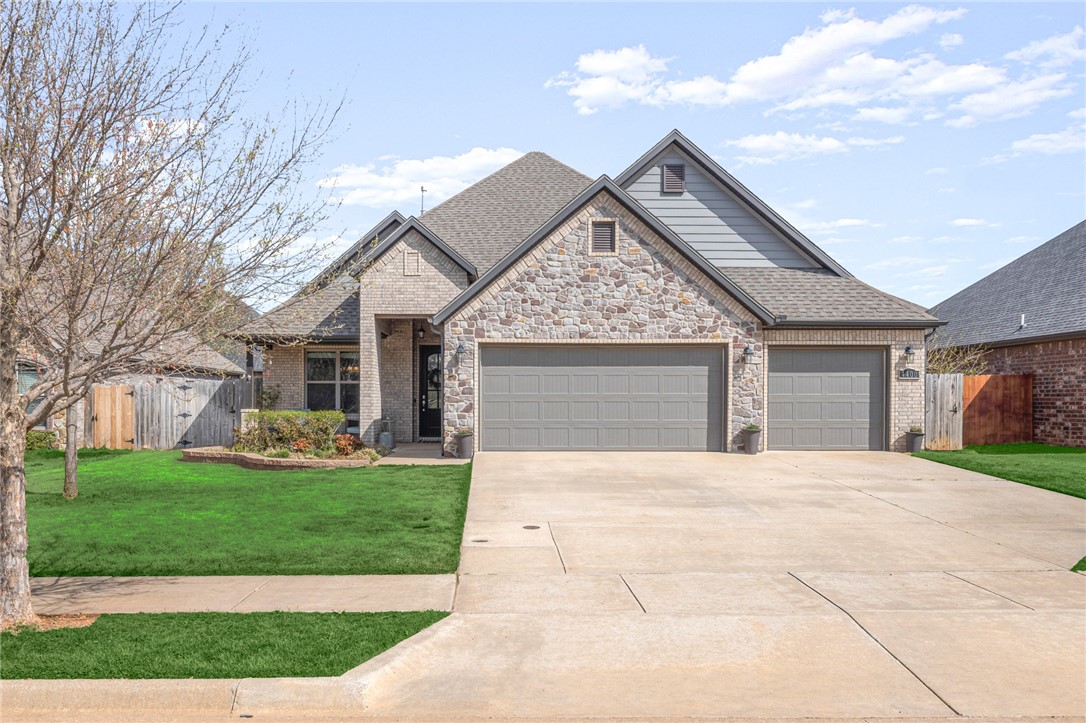 Beautiful 4 Bedroom home in Rolling Acres Subdivision! This home boasts great curb appeal with covered front porch and landscaped yard. Foyer entry welcomes you in. A guest bed with attached full bath located off entry. The spacious living area has a fantastic layout, with large living room, dining area and kitchen with double islands. The living room has a gas fireplace with ship lap detailing. The kitchen has granite counters, abundant workspace, gas range and huge pantry for even more storage. Primary suite has large windows overlooking backyard, and attached bath with large double vanity, soaking tub and shower. The large WIC connects to laundry room. There is a half bath on main level for guests along with mudroom area with access to the 3-car garage. Upstairs are two well-appointed guest rooms along with a guest bath w/double vanity. Outside enjoy a private and fenced backyard with covered patio and fresh landscaping. Located with easy access to Downtown, Walmart Home Office, XNA and much more. Welcome Home!