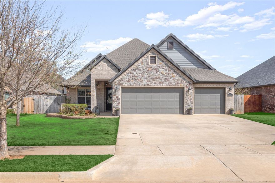 Beautiful 4 Bedroom home in Rolling Acres Subdivision! This home boasts great curb appeal with covered front porch and landscaped yard. Foyer entry welcomes you in. A guest bed with attached full bath located off entry. The spacious living area has a fantastic layout, with large living room, dining area and kitchen with double islands. The living room has a gas fireplace with ship lap detailing. The kitchen has granite counters, abundant workspace, gas range and huge pantry for even more storage. Primary suite has large windows overlooking backyard, and attached bath with large double vanity, soaking tub and shower. The large WIC connects to laundry room. There is a half bath on main level for guests along with mudroom area with access to the 3-car garage. Upstairs are two well-appointed guest rooms along with a guest bath w/double vanity. Outside enjoy a private and fenced backyard with covered patio and fresh landscaping. Located with easy access to Downtown, Walmart Home Office, XNA and much more. Welcome Home!