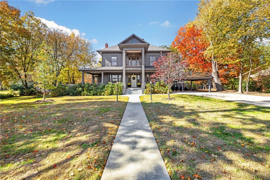 Step into a piece of Fayetteville history- meticulously reimagined for modern living. This iconic, fully renovated historic home combines restored architectural elements with high-end custom finishes. Situated on a large lot in the heart of town, you cannot recreate a property like this today.  Inside, the home offers exceptional flexibility with six true bedrooms, including two spacious primary suites, ideal for multi-generational living or luxurious guest accommodations. A separate studio apartment provides endless possibilities- perfect for in-laws, your home office, or even rental income- while a dedicated study and multiple flex spaces adapt effortlessly to your lifestyle needs. Spend your weekends walking to Wilson Park or the Fayetteville Farmers Market. If you've been looking for a historic estate in the center of town and zoned for Root Elementary, you must see this rare opportunity!