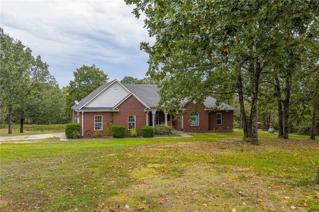 Welcome to your personal retreat on 4.55 beautiful acres in the Northridge area of Booneville. This home offers an open-concept layout with spacious living areas, abundant natural light, and a kitchen with plenty of cabinetry, generous counter space, and a great flow for entertaining. The primary suite features dual vanities, a jetted tub, walk-in shower, and walk-in closet. Upstairs, three bedrooms provide space for family, guests, or hobbies, while the finished basement includes a full bath and can be used as a second living area, game room, or possible fifth bedroom. A bonus office/flex room built inside the garage offers extra versatility. Outside, enjoy the covered pavilion, relaxing hot tub, and tranquil private pond. With 4.55 acres, thereās room to roam, garden, and host gatheringsāall while being just a short drive from schools, shopping, dining, and Boonevilleās charming downtown! Come love where you live!