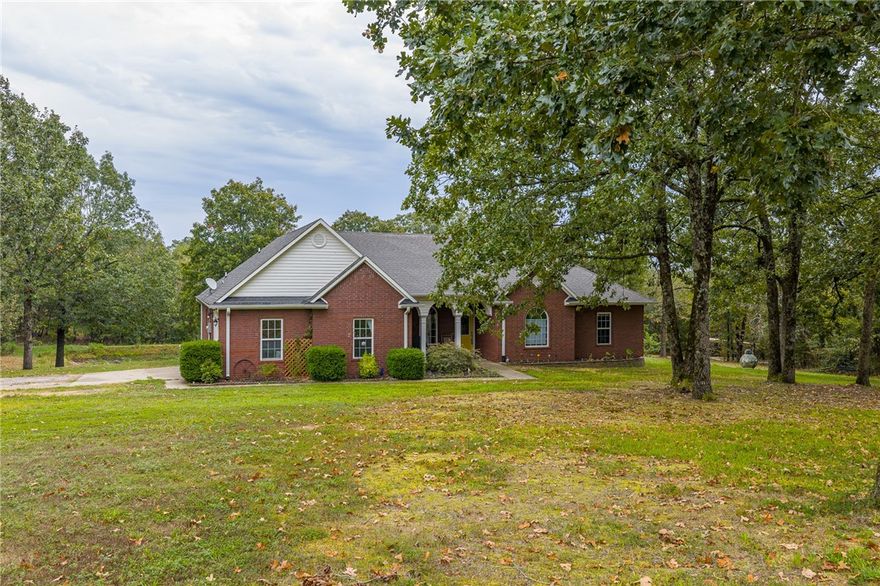 Welcome to your personal retreat on 4.55 beautiful acres in the Northridge area of Booneville. This home offers an open-concept layout with spacious living areas, abundant natural light, and a kitchen with plenty of cabinetry, generous counter space, and a great flow for entertaining. The primary suite features dual vanities, a jetted tub, walk-in shower, and walk-in closet. Upstairs, three bedrooms provide space for family, guests, or hobbies, while the finished basement includes a full bath and can be used as a second living area, game room, or possible fifth bedroom. A bonus office/flex room built inside the garage offers extra versatility. Outside, enjoy the covered pavilion, relaxing hot tub, and tranquil private pond. With 4.55 acres, there’s room to roam, garden, and host gatherings—all while being just a short drive from schools, shopping, dining, and Booneville’s charming downtown!  Come love where you live!